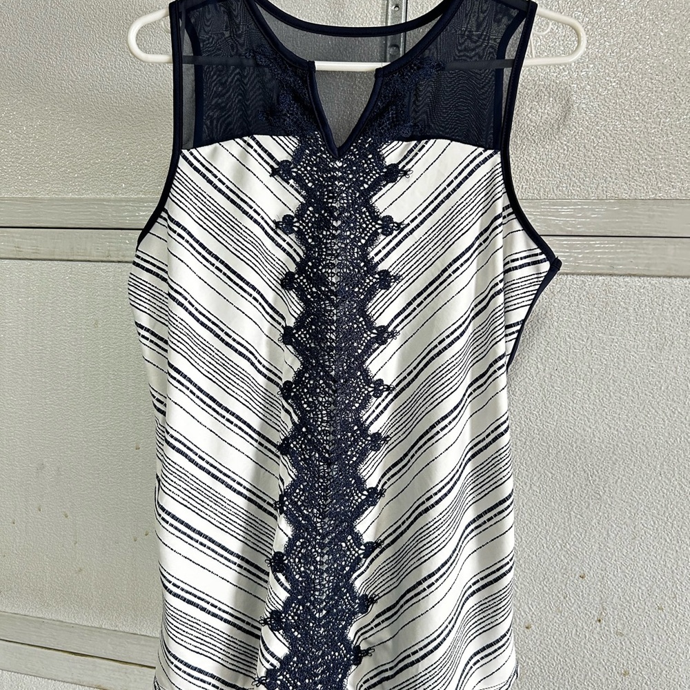 Super cute, navy and white tank tops like new Maurice’s Medium